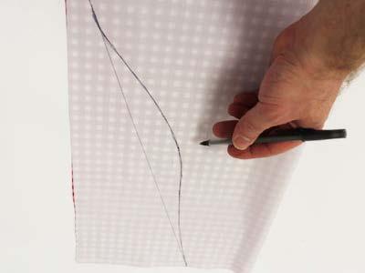 To give the apron a naturally curvy shape, measure and mark 1 1/2" in along the right side of the line just drawn,