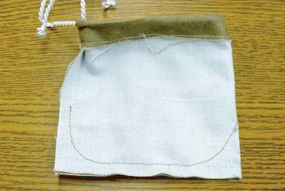 mark. Move needle position to second mark, backtack at mark and sew along