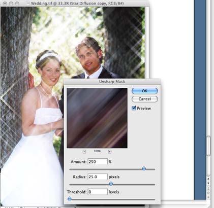 First, select any one of the two Star Diffusion layer and choose Filter> Sharpen> Unsharp Mask.