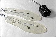 vibrating insoles (figure on the left) Active: tilt sensors & vibrotactile actuators