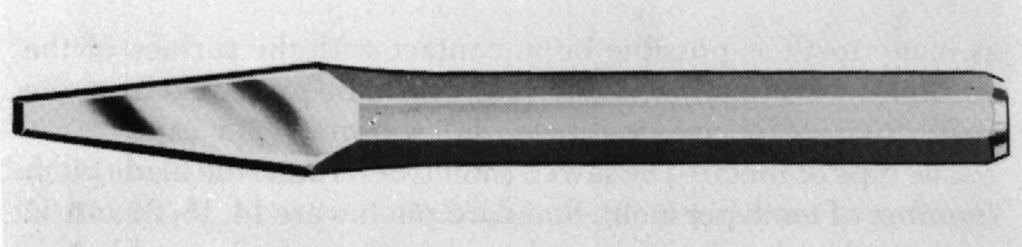 The adjustable frame hacksaw (Figure 1-14) can be changed to hold 8-inch, 10-inch, and 12-inch blades. Most blades are 1 2-inch wide and 1 4-inch thick. Figure 1-14 Adjustable frame hacksaw.