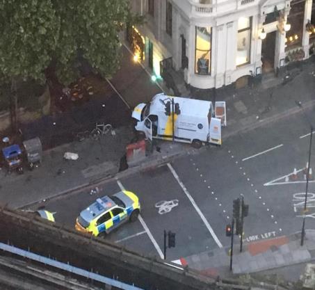 After their van plows into a crowd, terrorists engage in a stabbing attack in London, England.