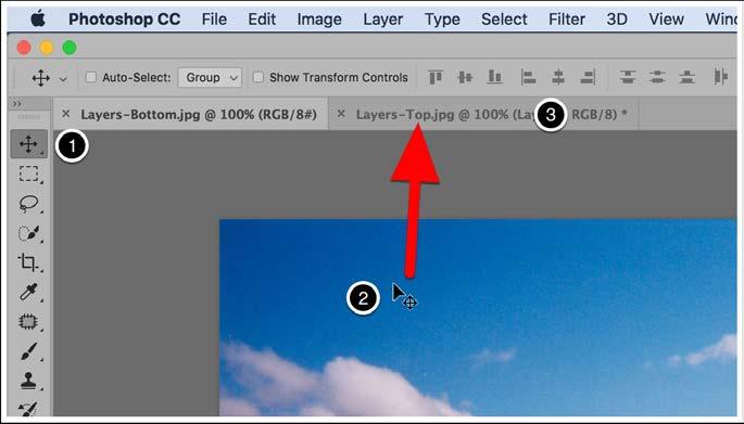 2. In the Layers-Bottom image, hold the left mouse button and drag the cursor to the document tab