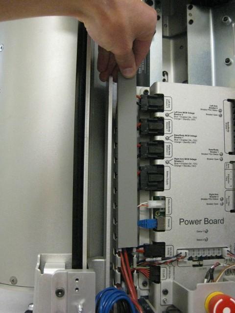 Drawing 6: Lower the air duct to allow power board removal. 6. Remove cable cover on left-hand side of the power board.