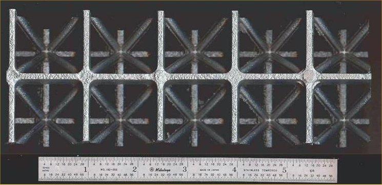 1. Introduction A sectioned specimen that had been removed from a larger aluminum (Al) truss structure was provided.