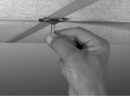 Using the floor plan for reference and working in teams of two, fasten the ceiling channel clips to the ceiling grid securely. Caution: Do not over tighten ceiling clips, screws or anchors. 5.
