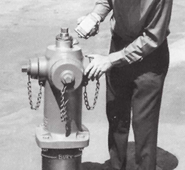 Tighten Hold Down Nut to 100 ft-lbs and bend Lock Washer Ears over Hold Down Nut flats in two places and over Operating Housing in two places. Open Hydrant fully and loosen 11.