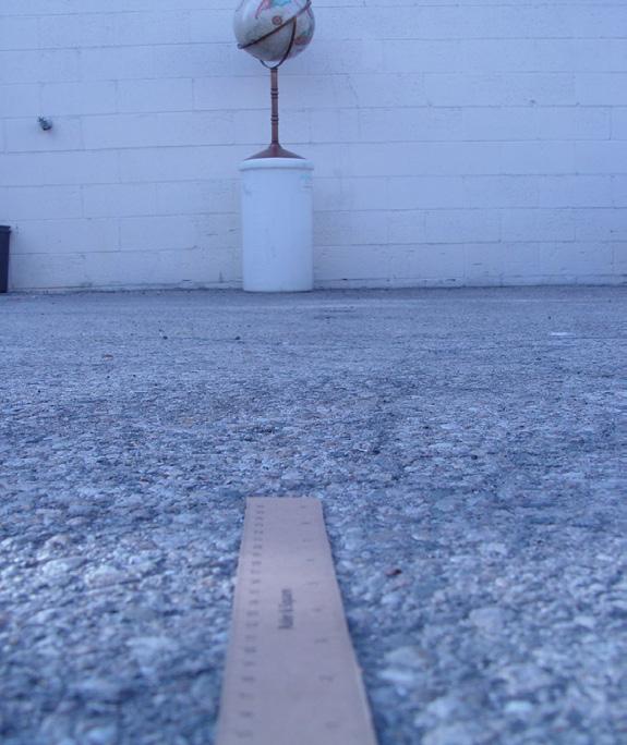 15 Using the ruler, measure the distance in feet or inches from where you are standing to the base of the object or to the space directly below the object (if it is hanging on a wall or from the