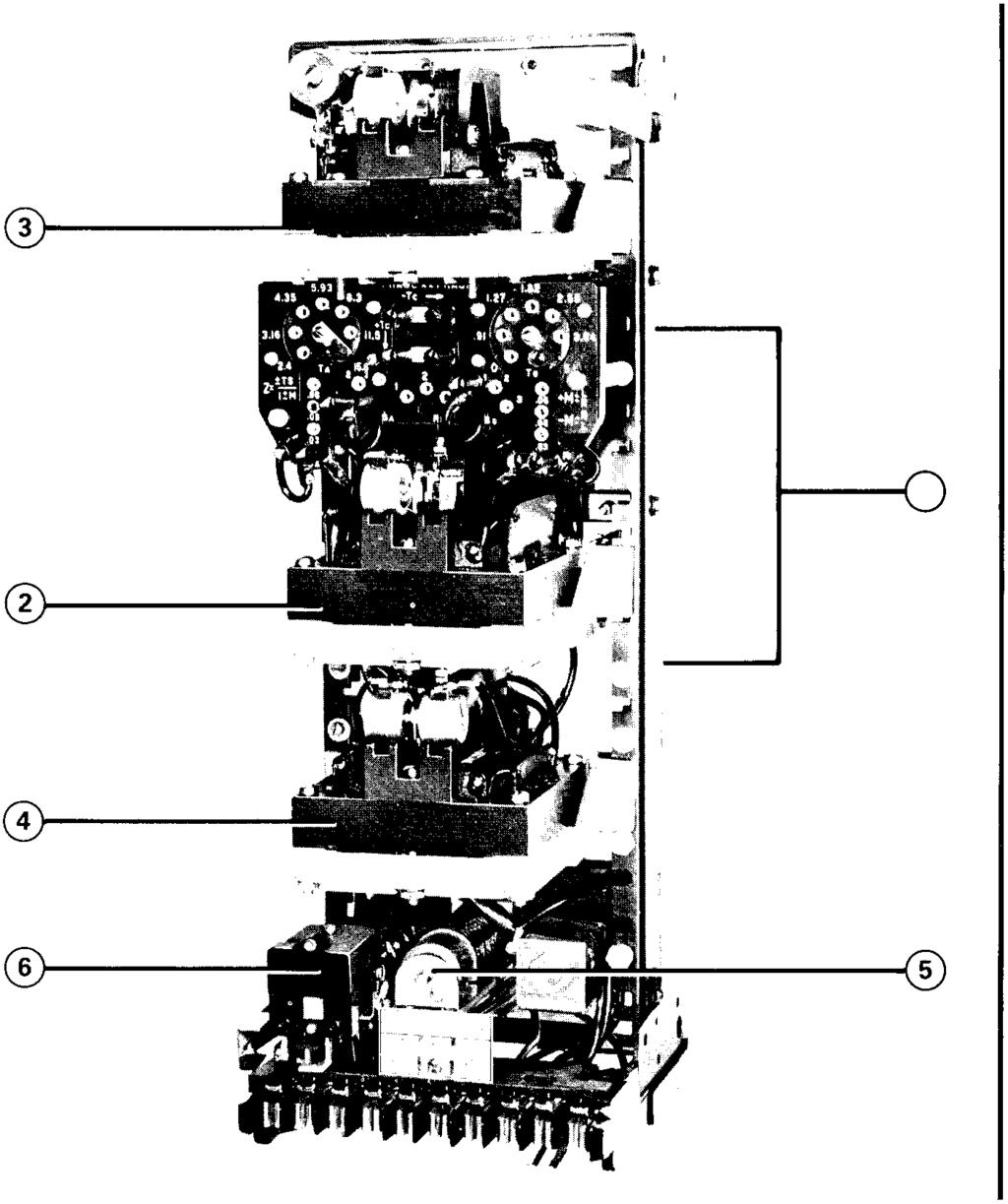 The primary winding of the shortreach compensator Tc also has seven taps which terminate at this tap block.