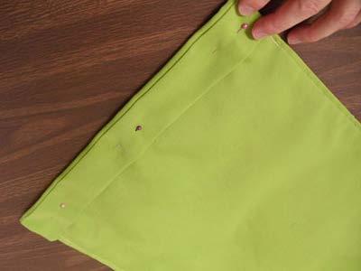To create the top pocket, fold the top edge over 2" to the back and pin in place.