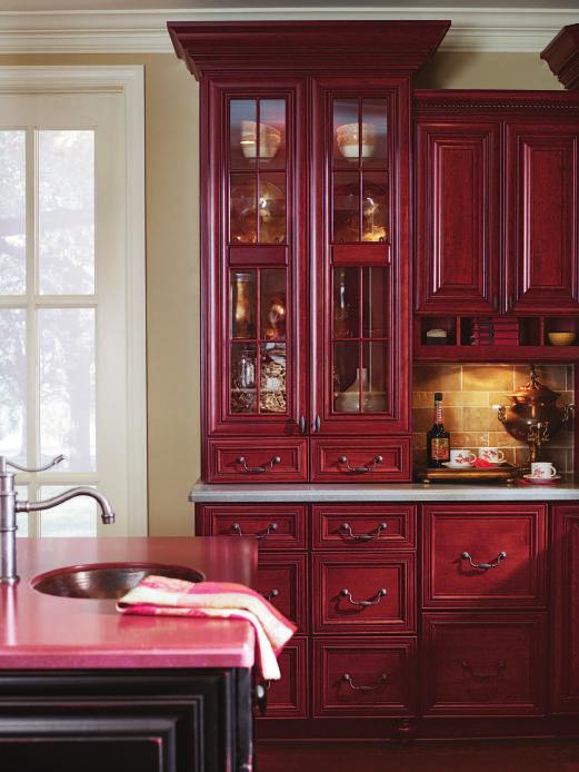 ARLINGTON Wood: Cherry Finish: Burgundy w/coffee glaze Island Wood: Maple Finish: Blackberry Heirloom STATELY and IMPRESSIVE A richly Old World kitchen with ornate mouldings and rich finishes.