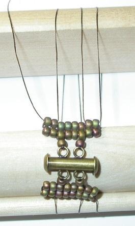 (green) Pass right to left through top starter beads G&H (green) and draw thread