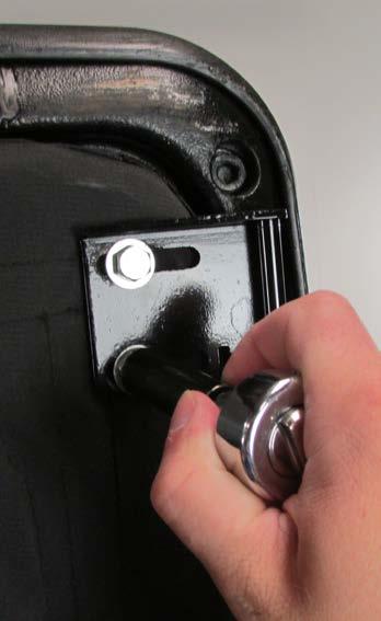 bolt into the closed position of the rotary latch. There should be two clicks when it is fully latched.