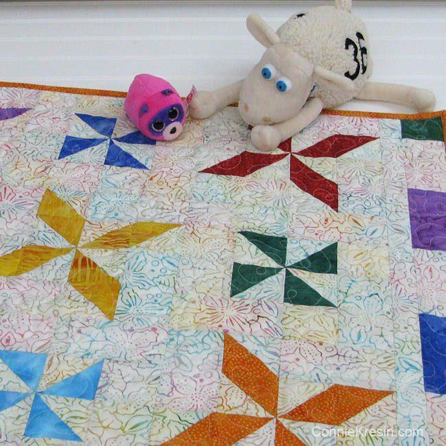 I made a cute little batik quilt that can