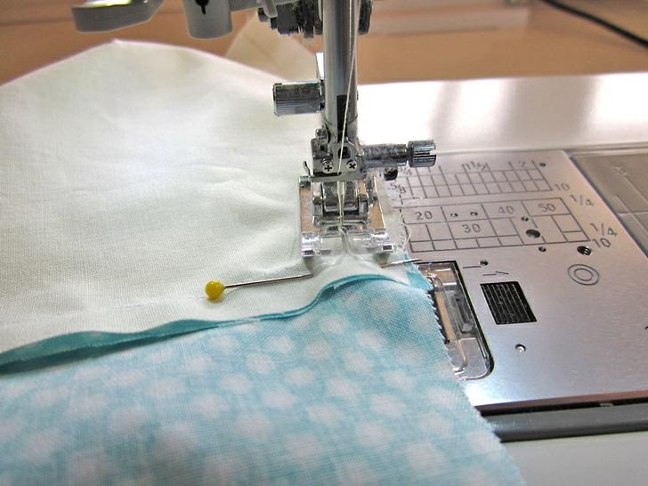 Stitch the front and lining layers together, using a ½" seam allowance.
