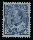 block of four, mint with top stamps