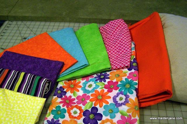 I started with the floral and added coordinating fabrics. 1. Wash and preshrink fabrics. I lived on the wild side and threw all my half yard cuts without finishing the edges.