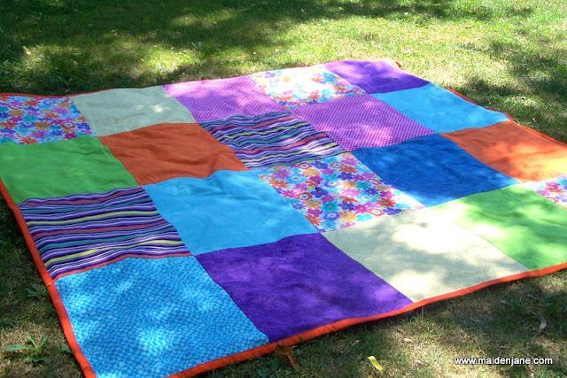 This beach/picnic blanket is 6 feet x 7 feet - big