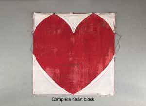 When you get to the very tip, drop your needle, rotate the piece, and continue along the next side. 7. Continue all the way around the heart. 8. Sit back, admire your heart. Isn t it cute? Pet it.