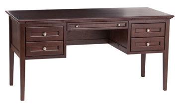 Center utility drawer features a drop front and cord access for