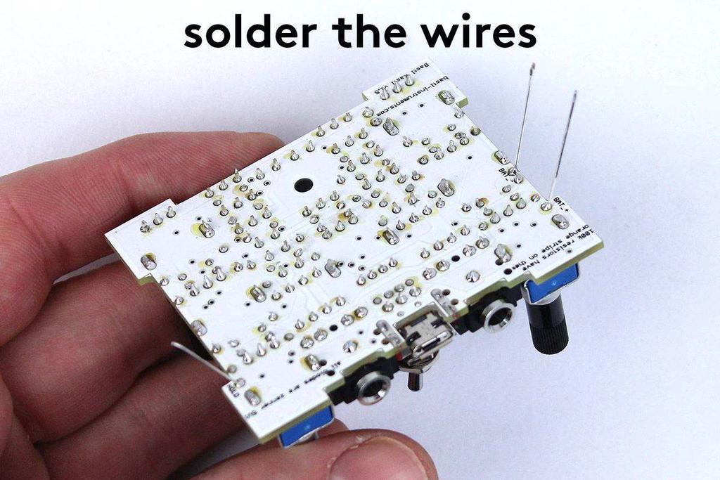 Put these wires through the " HOLD, " BAT_- and " BAT_+ holes