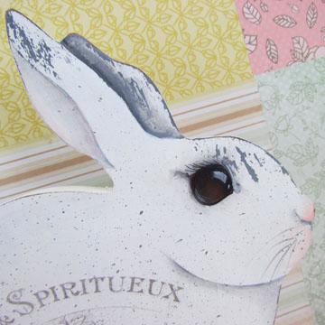 Step 4 Using fine sandpaper, gently rub over the surface of the bunnies to remove the dry paint in the