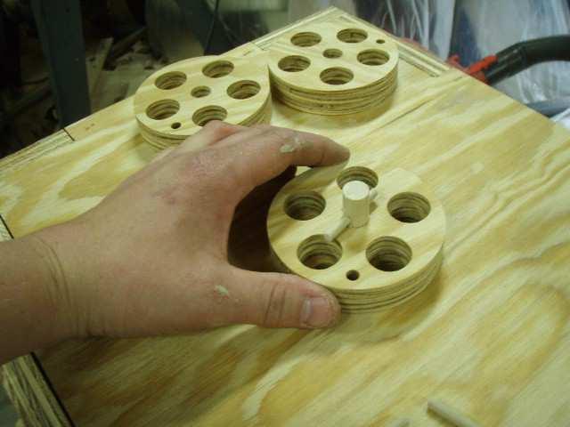 Glue the 1/2 dowel into all of the center holes on the