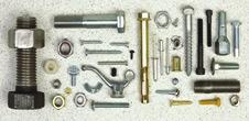 Components are the smaller parts that make up a product, often used to join materials together.