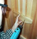 Using #4 finishing nails (Pneumatic nailer preferred), nail the cove molding to the interior walls.
