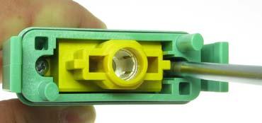 Push the axial screw contact into the module until you hear an audible click, which