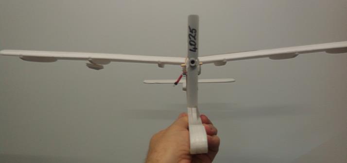 If the wings are not level, lightly sand down the foam wing support on the high side till the wings sit level.
