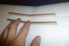 Bend a wire to fit both top and bottom of each wood brace to keep the wood from splitting 43.