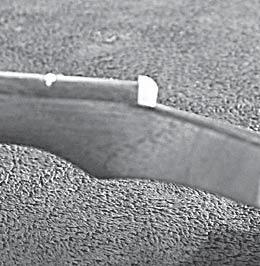 sharp pencil (fig 64a). It looks most professional to trim the nut to match the curve of the wood below it.