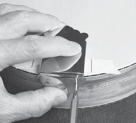 masking tape at the tail end of the soundboard (fig 66a).