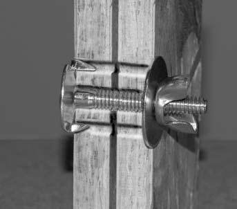 Joining Left & Right Sides of the Frame Washer Bolt Prongs in guide holes Wingnut