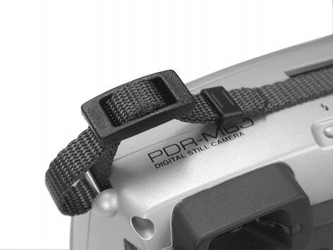 Pass the leading end of the strap through the strap attachment 1, and then pass through both ends of the strap adjuster 2.