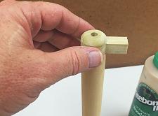 This scrap dowel is NOT to be glued in place, but is only used for alignment of these parts.