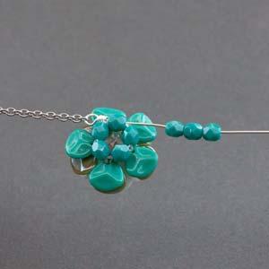 Step 17 String these beads in the following sequence onto the wire: 1 B from the base of one flower