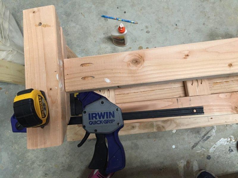4. Attach the bench seat top. A. Center the frame on the underside of the bench top.