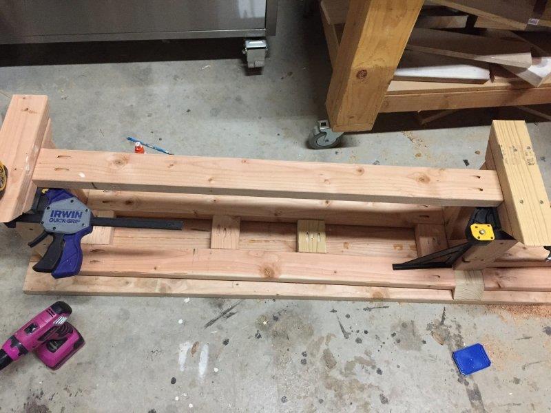 frame along the length of the bench. B.