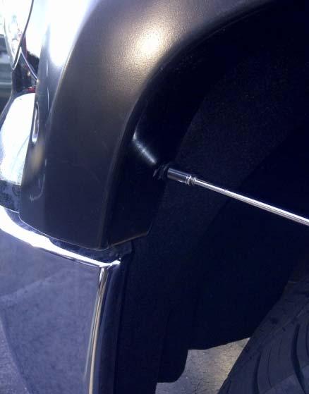Ensure the slot in the front end of Fender Flare is located over the vacant hole in the upper front wheel arch molding.