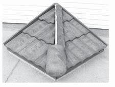 81 cm) EPDM, reflash and cant block (by flat roofer) Quarrix Tile Blocking & Rake/Hip Trim Optional grout Hip trim Hip nailer Adhesive between