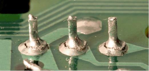 62 T7D09 What is the characteristic appearance of a cold solder joint?