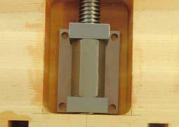 Stop periodically and check the measurements from the inside edge of your vise jaw assembly to the outside edge of your bench top to ensure the Chain Drive Vise is threading evenly into the