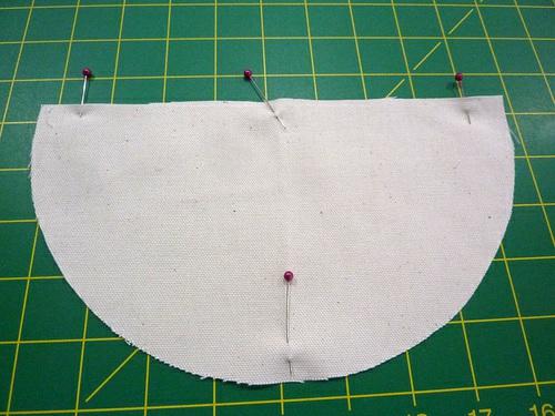 5. Set the base into the open bottom end of the lining