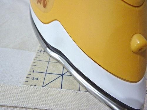 3. Unfold this edge so the crease line is visible
