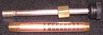 Update-Handle: A telescoping handle was made from a 1/8" pipe nipple, a piece of 1/4" stainless steel rod, a pipe cap and a knob.