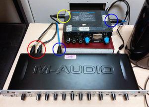 Connections. Head mounted mics connected in channels 1 and 2 (circled in red), amp connected to channel 5 (circled in blue), stand mic connected to amp (circled in yellow) Contents 1 Setup 1.