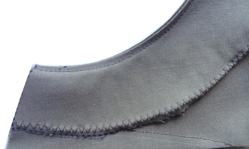 Stitch the armholes together using a 3/8 seam allowance. 5. Trim down the seam allowance to 1/4 or less along the curved areas then press to the facing side. 6.