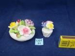 31 A Royal Doulton candle holder and an ornamental posy bowl both decorated